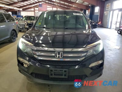 Piąte zdjęcie samochodu w środku: 2018 HONDA PILOT EXL VIN:5FNYF6H59JB057935 - miniatura