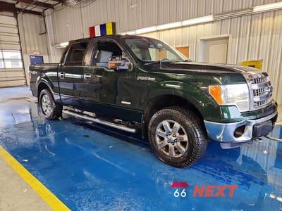 Czwarte zdjęcie samochodu z boku: 2014 FORD F150 SUPERCREW VIN:1FTFW1ET7EFB76002 - miniatura