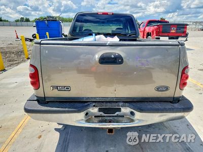 Zdjęcie 6 z 12 samochodu: 2001 FORD F150 VIN:1FTZX07261KF29064 - miniatura