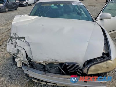 Zdjęcie 11 z 13 samochodu: 2000 BUICK PARK AVENUE ULTRA VIN:1G4CU5217Y4156508 - miniatura