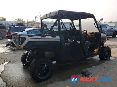 Czwarte zdjęcie samochodu z boku: 2023 POLARIS RANGER CREW XP 1000 UTILITY VEHICLE VIN:4XARSE997P8093103 - miniatura