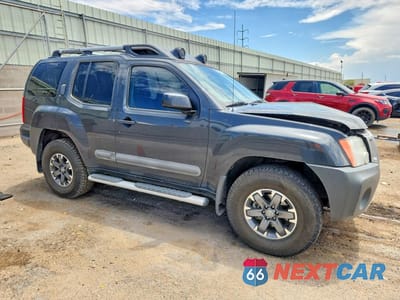 Czwarte zdjęcie samochodu z boku: 2014 NISSAN XTERRA PRO-4X VIN:5N1AN0NW9EN807576 - miniatura