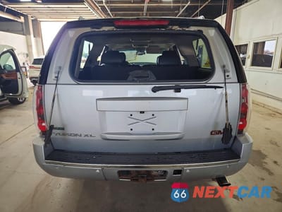 Zdjęcie 6 z 13 samochodu: 2012 GMC YUKON XL DENALI VIN:1GKS2MEF2CR275364 - miniatura