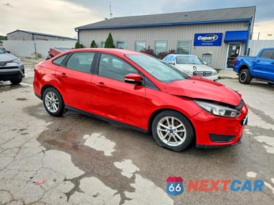 Czwarte zdjęcie samochodu z boku: 2016 FORD FOCUS SE VIN:1FADP3F25GL325362 - miniatura