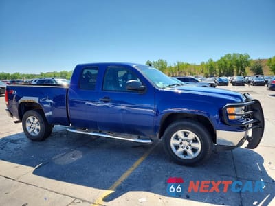 Czwarte zdjęcie samochodu z boku: 2013 GMC SIERRA K1500 SLE VIN:1GTR2VE72DZ303917 - miniatura