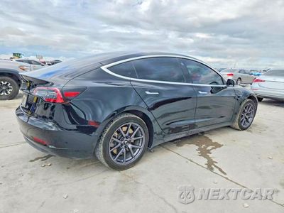 Trzecie zdjęcie samochodu z tyłu: 2019 TESLA MODEL 3 VIN:5YJ3E1EA9KF296341 - miniatura