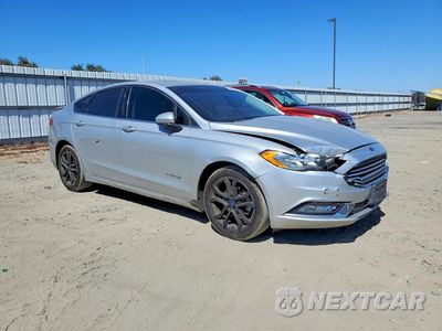 Czwarte zdjęcie samochodu z boku: 2018 FORD FUSION SE HYBRID VIN:3FA6P0LU2JR128672 - miniatura