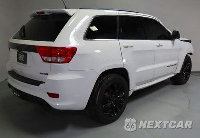 Trzecie zdjęcie samochodu z tyłu: 2013 JEEP GRAND CHEROKEE SRT-8 VIN:1C4RJFDJ4DC563714 - miniatura