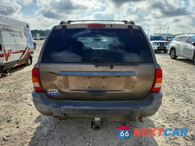 Zdjęcie 6 z 12 samochodu: 2001 JEEP GRAND CHEROKEE LAREDO VIN:1J4GW48S71C657740 - miniatura
