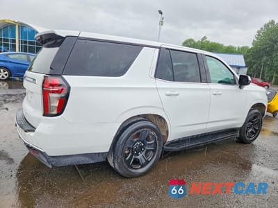 Trzecie zdjęcie samochodu z tyłu: 2022 CHEVROLET TAHOE C1500 VIN:1GNSCLED6NR247787 - miniatura