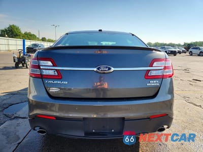 Zdjęcie 6 z 12 samochodu: 2016 FORD TAURUS SEL VIN:1FAHP2E82GG138638 - miniatura