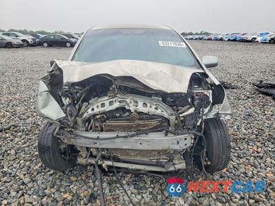 Piąte zdjęcie samochodu w środku: 2010 TOYOTA YARIS BASE VIN:JTDKT4K35A5321776 - miniatura
