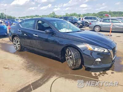 Czwarte zdjęcie samochodu z boku: 2022 NISSAN ALTIMA PLATINUM VIN:1N4BL4FW6NN396275 - miniatura