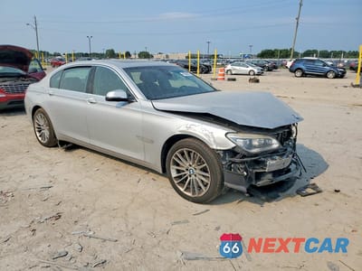 Czwarte zdjęcie samochodu z boku: 2014 BMW 750 LXI VIN:WBAYF8C58ED141810 - miniatura
