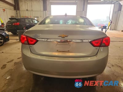 Zdjęcie 6 z 13 samochodu: 2018 CHEVROLET IMPALA LT VIN:2G1105S32J9102442 - miniatura