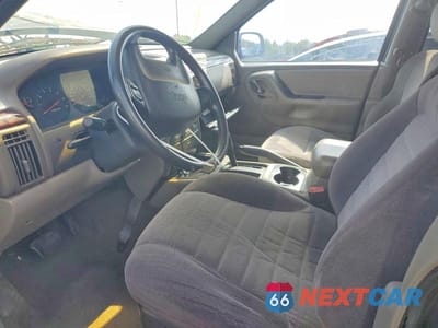 Zdjęcie 7 z 12 samochodu: 2000 JEEP GRAND CHEROKEE LAREDO VIN:1J4G248S2YC399844 - miniatura