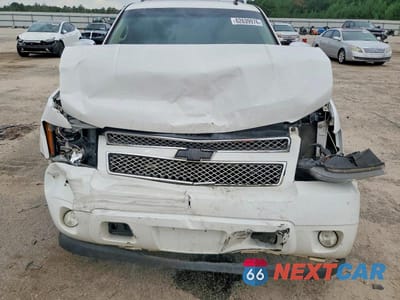 Zdjęcie 12 z 14 samochodu: 2011 CHEVROLET TAHOE C1500 LT VIN:1GNSCBE05BR336415 - miniatura