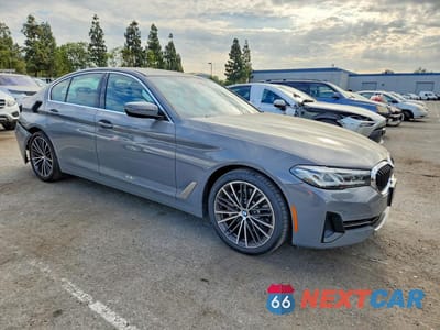 Czwarte zdjęcie samochodu z boku: 2021 BMW 530E VIN:WBA13AG05MCG79565 - miniatura