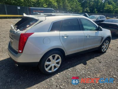 Trzecie zdjęcie samochodu z tyłu: 2014 CADILLAC SRX PREMIUM COLLECTION VIN:3GYFNDE39ES596306 - miniatura
