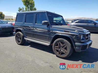 Czwarte zdjęcie samochodu z boku: 2014 MERCEDES-BENZ G 63 AMG VIN:WDCYC7DF1EX218927 - miniatura