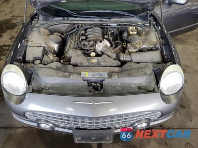Zdjęcie 11 z 13 samochodu: 2003 FORD THUNDERBIRD VIN:1FAHP60A63Y105437 - miniatura