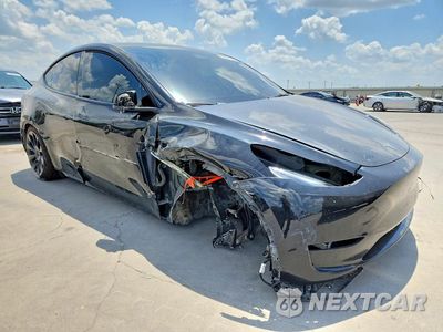 Czwarte zdjęcie samochodu z boku: 2023 TESLA MODEL Y VIN:7SAYGAEE8PF832113 - miniatura