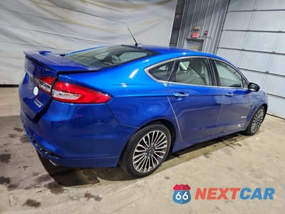 Trzecie zdjęcie samochodu z tyłu: 2017 FORD FUSION TITANIUM HEV VIN:3FA6P0RU9HR375477 - miniatura