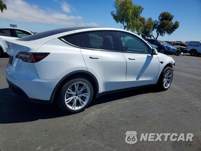 Trzecie zdjęcie samochodu z tyłu: 2021 TESLA MODEL Y VIN:5YJYGDEE3MF096918 - miniatura