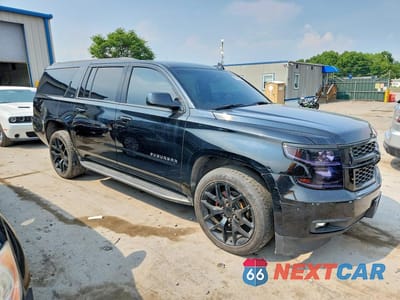 Czwarte zdjęcie samochodu z boku: 2019 CHEVROLET SUBURBAN K1500 LT VIN:1GNSKHKCXKR113663 - miniatura