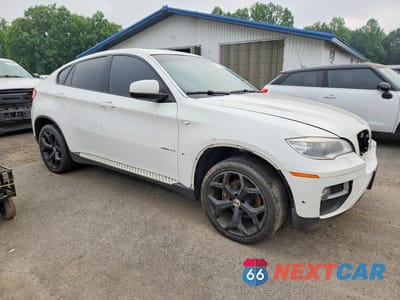 Czwarte zdjęcie samochodu z boku: 2014 BMW X6 XDRIVE35I VIN:5UXFG2C59E0C43338 - miniatura
