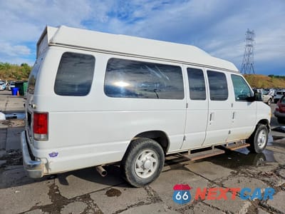 Trzecie zdjęcie samochodu z tyłu: 1999 FORD ECONOLINE E350 SUPER DUTY WAGON VIN:1FBSS31L9XHB43252 - miniatura