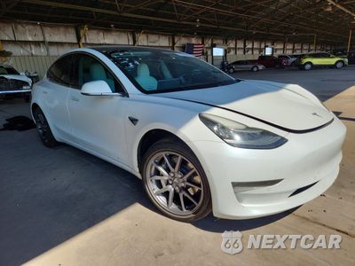 Czwarte zdjęcie samochodu z boku: 2018 TESLA MODEL 3 VIN:5YJ3E1EB3JF096739 - miniatura