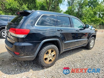 Trzecie zdjęcie samochodu z tyłu: 2017 JEEP GRAND CHEROKEE LAREDO VIN:1C4RJFAG8HC729618 - miniatura