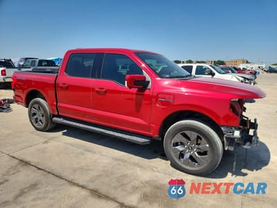 Czwarte zdjęcie samochodu z boku: 2022 FORD F150 LIGHTNING PRO VIN:1FT6W1EV0NWG02999 - miniatura