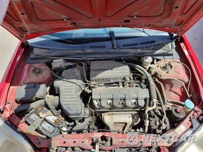 Zdjęcie 11 z 12 samochodu: 2003 HONDA CIVIC LX VIN:1HGEM21533L066546 - miniatura