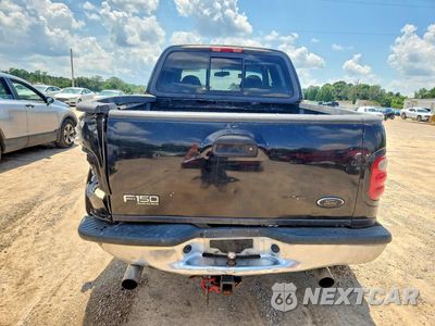 Zdjęcie 6 z 12 samochodu: 2002 FORD F150 SUPERCREW VIN:1FTRW08L42KC51499 - miniatura