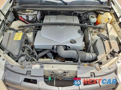 Zdjęcie 12 z 13 samochodu: 2005 CADILLAC SRX VIN:1GYEE637350145456 - miniatura