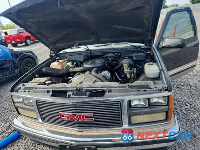 Zdjęcie 11 z 12 samochodu: 1989 GMC SIERRA C1500 VIN:1GTDC14H2KZ530239 - miniatura
