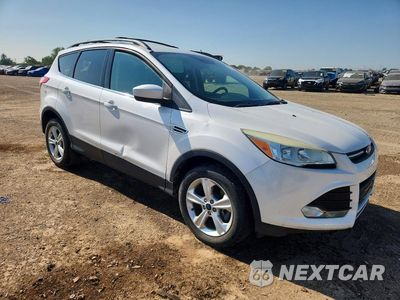 Czwarte zdjęcie samochodu z boku: 2013 FORD ESCAPE SE VIN:1FMCU0G90DUD84281 - miniatura