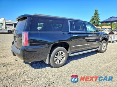 Trzecie zdjęcie samochodu z tyłu: 2015 GMC YUKON XL K1500 SLE VIN:1GKS2GKC6FR502393 - miniatura