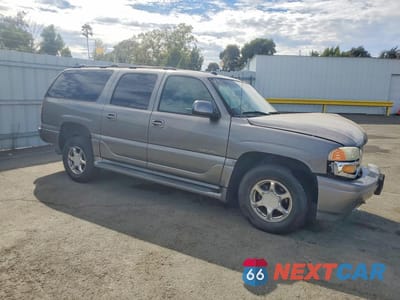 Czwarte zdjęcie samochodu z boku: 2005 GMC YUKON XL DENALI VIN:1GKFK66U75J116304 - miniatura