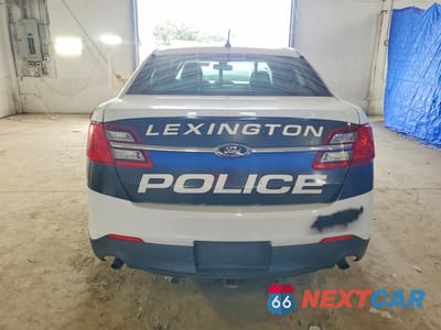 Zdjęcie 6 z 12 samochodu: 2015 FORD TAURUS POLICE INTERCEPTOR VIN:1FAHP2MK1FG204012 - miniatura