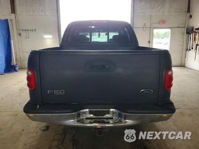 Zdjęcie 6 z 12 samochodu: 2001 FORD F150 SUPERCREW VIN:1FTRW08L71KF90255 - miniatura
