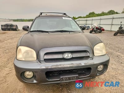 Piąte zdjęcie samochodu w środku: 2005 HYUNDAI SANTA FE GLS VIN:KM8SC73D25U987803 - miniatura