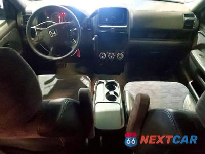 Zdjęcie 8 z 13 samochodu: 2004 HONDA CR-V LX VIN:JHLRD68404C024098 - miniatura