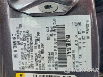Zdjęcie 12 z 12 samochodu: 2014 FORD FUSION S VIN:3FA6P0G79ER335098 - miniatura