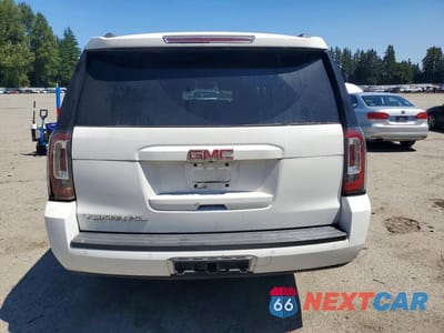 Zdjęcie 6 z 13 samochodu: 2015 GMC YUKON XL K1500 SLE VIN:1GKS2GKC0FR651351 - miniatura