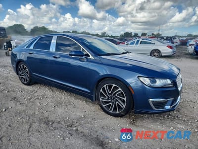 Czwarte zdjęcie samochodu z boku: 2019 LINCOLN MKZ VIN:3LN6L5A98KR627068 - miniatura