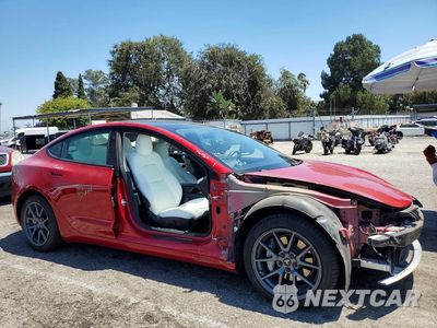 Czwarte zdjęcie samochodu z boku: 2021 TESLA MODEL 3 VIN:5YJ3E1EB8MF874313 - miniatura