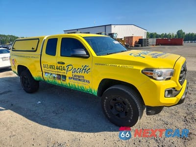 Czwarte zdjęcie samochodu z boku: 2016 TOYOTA TACOMA SR5 VIN:5TFSX5EN7GX040857 - miniatura